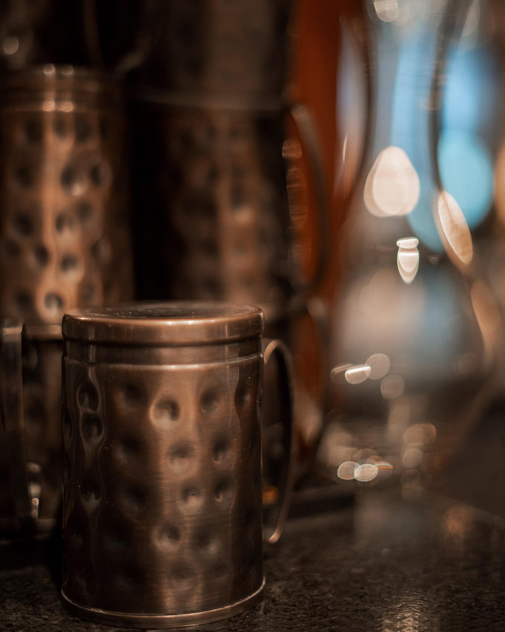 A artsy photo of a metal chalice